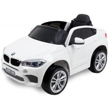 BMW X6 kinderauto wit zijaanzicht banden deur